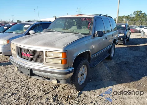 1999 GMC Yukon Sle z USA, uszkodzony, nr VIN 1GKEK13R3XJ735550